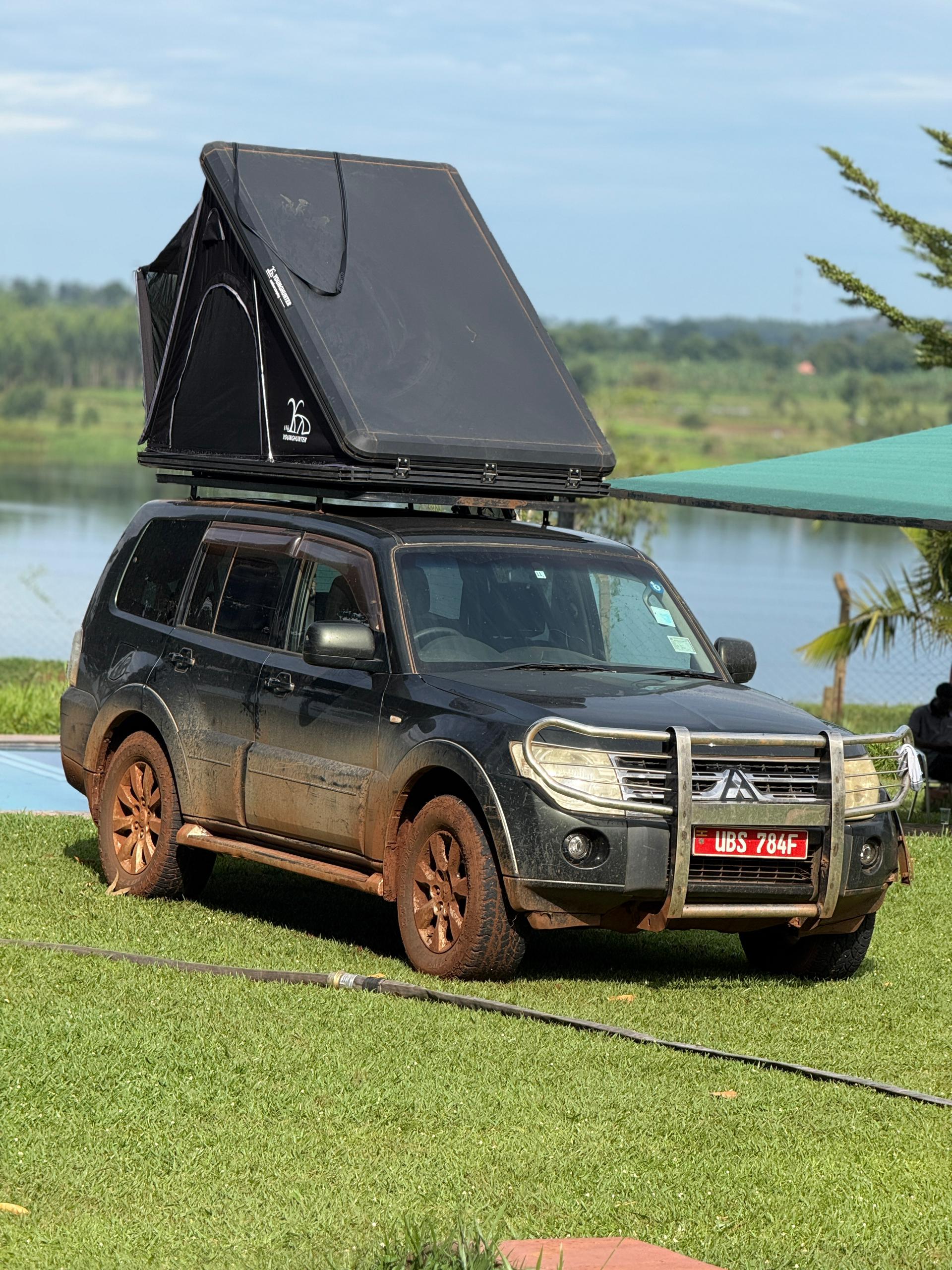 Mitshubishi Pajero with a roof top tent for rent across borders in Uganda, Kenya, Tanzania, Rwanda and Zanzibar